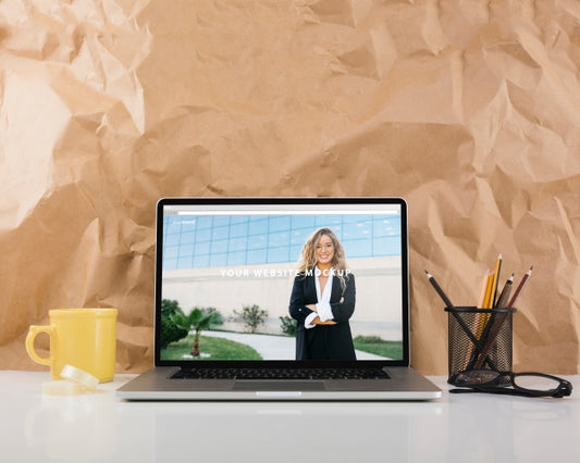 Free Website Mockup With Laptop On Desk Psd