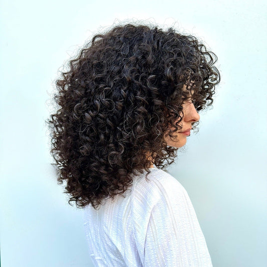 15 Stylish Layered Curly Hairstyles for Every Length