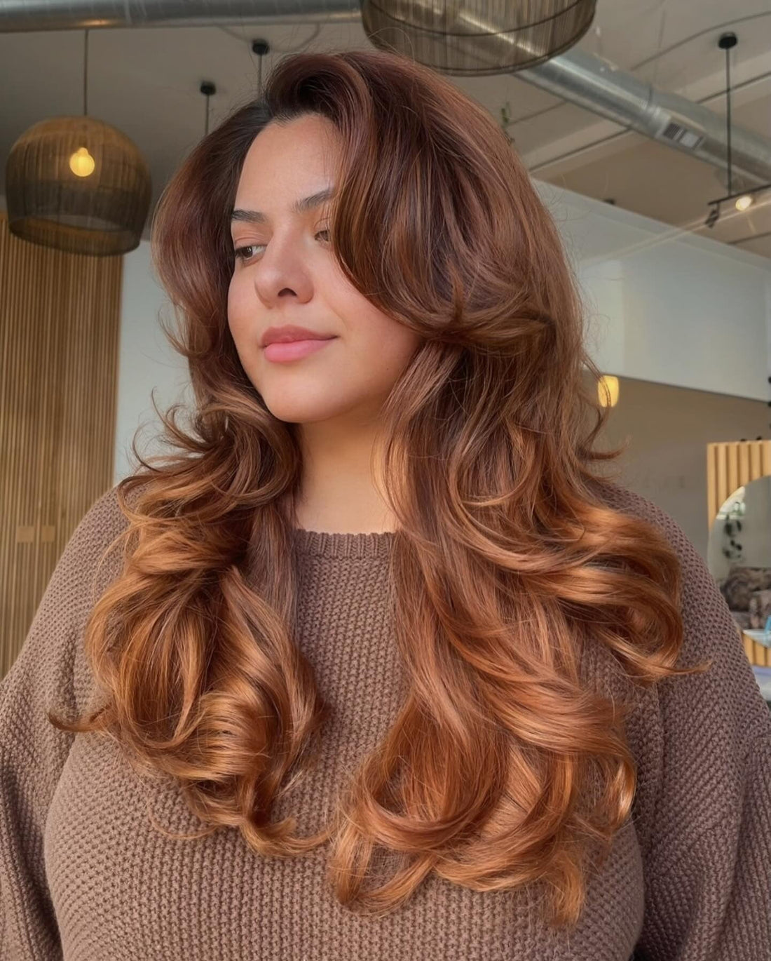 15 Gorgeous Wavy Hairstyles with Bangs 2026