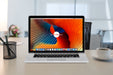 Free Apple Macbook Pro Retina On Workstation Mockup