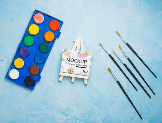 Free Artist Concept Assortment With Canvas Mock-Up And Watercolors Psd