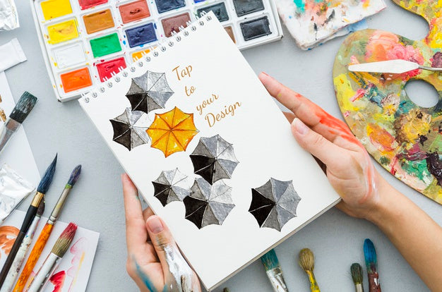 Free Artistic And Colorful Concept On Notebook Psd