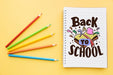 Free Back To School Mockup With Notebook And Four Pencils Psd