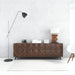 Free Blank White Wall Mockup With Wooden Table And Lamps Psd