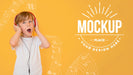 Free Boy Listening To Music Through Headphones With Background Mock-Up Psd