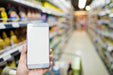 Free Browsing Smartphone In Supermarket Psd