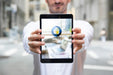 Free Businessman Using Tablet Mockup Psd