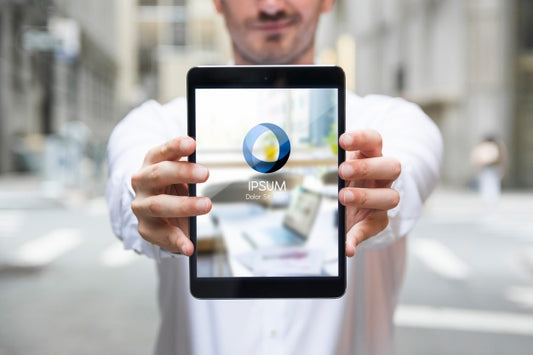 Free Businessman Using Tablet Mockup Psd