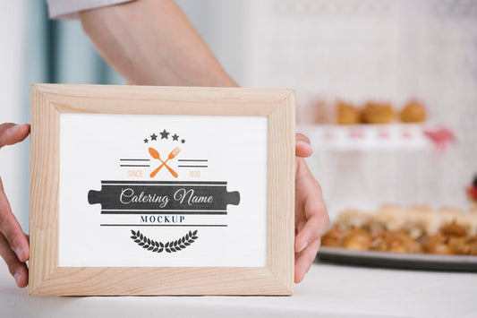 Free Catering Name On Wooden Frame Psd
