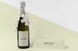 Free Champagne Bottle Mock-Up With White Ribbons And Bows Psd