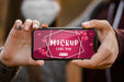 Free Close-Up Couple With Mask Holding Phone Psd