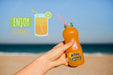 Free Close Up Hand Holding Beverage Bottle With Copy Space Psd