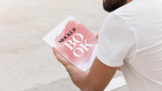 Free Close Up Man On Street Reading Book Psd