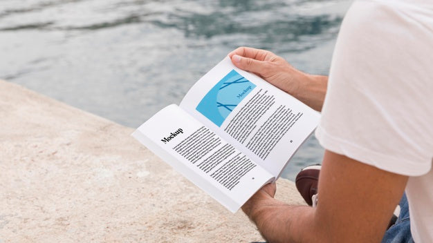 Free Close Up Man On Street Reading Book Psd