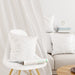 Free Closeup Of White Pillowcase On A Modern Chair Mockup Psd
