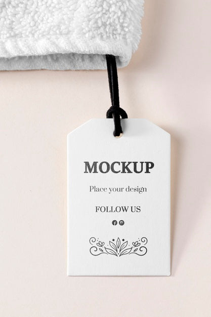 Free Clothing Mock-Up Tag With Thread On Towel Psd