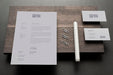 Free Composition Of Mock-Up Stationery On Wood Psd