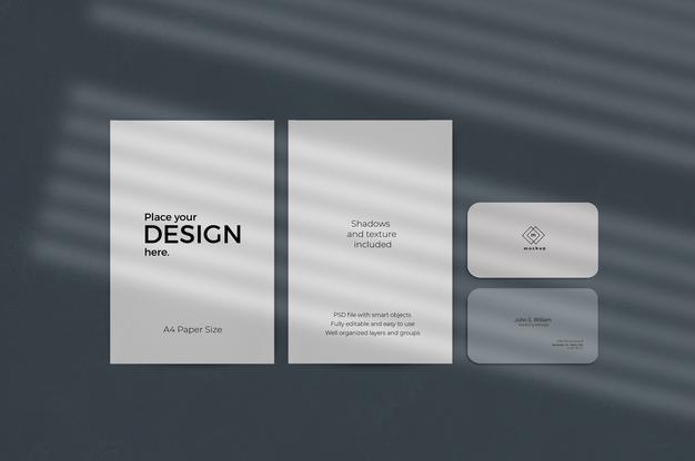 Free Corporate Stationary Set Mockup With Window Shadow Effect On Blue Wall Psd
