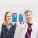Free Couple Showing Smartphone Psd