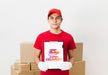 Free Delivery Man Holding Clipboard Near Parcels Mock-Up Psd