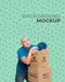Free Delivery Man Looking Tired Next To A Bunch Of Boxes With Background Mock-Up Psd