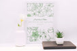 Free Desk Composition With Flower Decor And Frame Mockup Psd