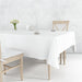 Free Dining Table Mockup With White Cloth And Wooden Chairs Psd