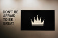 Free Don'T Be Afraid To Be Great Quoted On A Wall Next To A Crown Board Mockup Psd