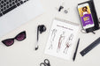 Free Fashion Sketch On Desk With Tools Beside Psd