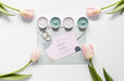 Free Fat Lay Of Wedding Card With Candles And Tulips Psd