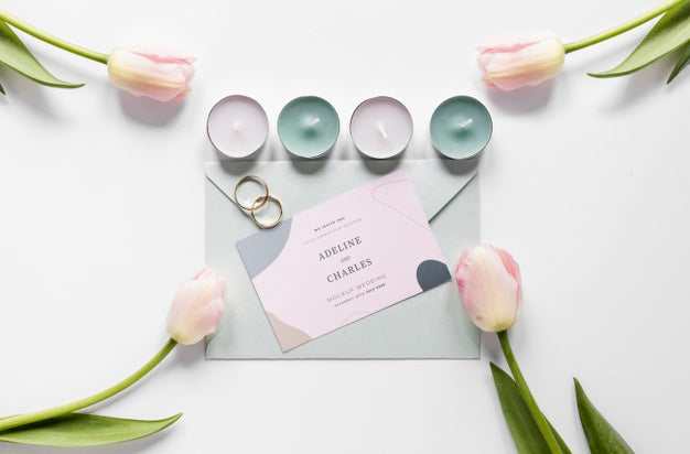 Free Fat Lay Of Wedding Card With Candles And Tulips Psd