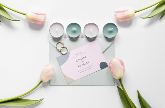 Free Fat Lay Of Wedding Card With Candles And Tulips Psd