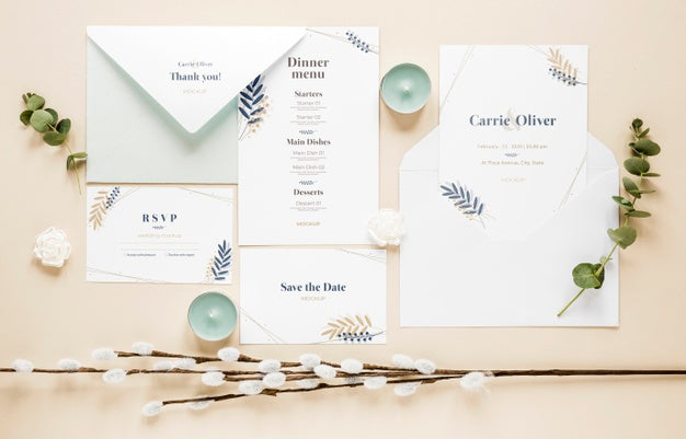Free Fat Lay Of Wedding Cards With Plants And Candles Psd