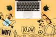 Free Flat Lay Of Desk Surface With Laptop And Plants Psd