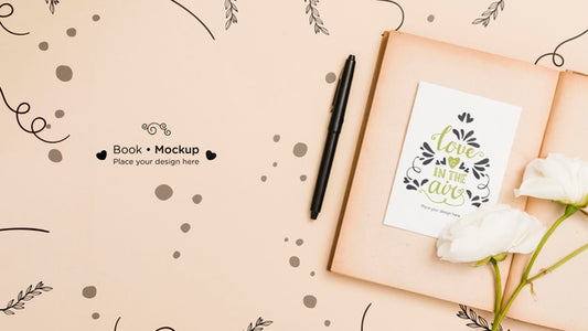 Free Flat Lay Of Open Book With Roses And Pen Psd