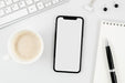 Free Flat Lay Smartphone Mock-Up With Empty Cup On Desk Psd