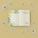 Free Floral Frame With Spring Card On Table Psd