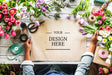 Free Florist Showing Empty Design Space Paper On Wooden Table With Fresh Flowers Decorate