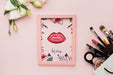 Free Frame On Table And Cosmetic Products Psd