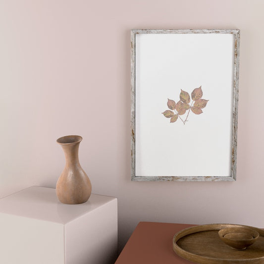 Free Frame On Wall With Leaves And Vase Decor Psd
