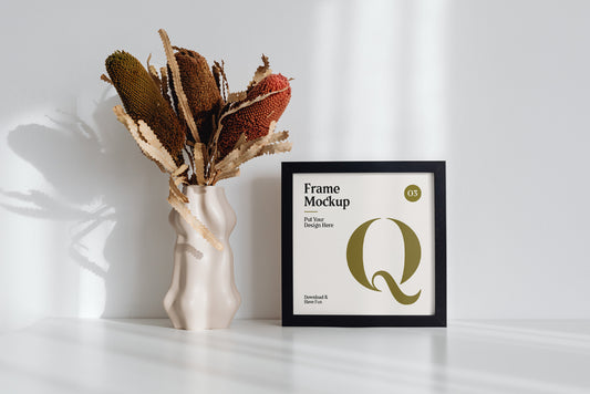 Free Frame With Flower On Desk Mockup
