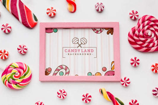 Free Frame With Tasty Candies Beside Psd