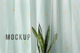 Free Fresh Snake Plant In Front Of A White Curtain Mockup Psd
