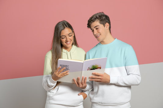 Free Front View Of Man And Woman Holding Book Psd