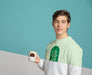 Free Front View Of Man In Sweater Holding Mug Psd
