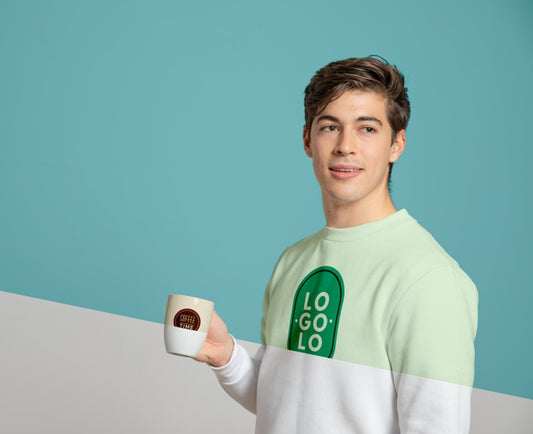 Free Front View Of Man In Sweater Holding Mug Psd