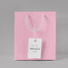 Free Front View Of Paper Shopping Bag Mock-Up With Paper Tag Psd
