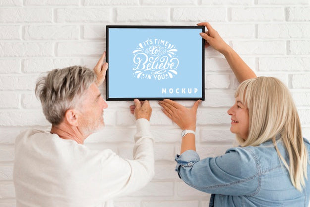 Free Front View Of Woman Holding A Frame Mock-Up Psd