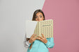 Free Front View Of Woman Holding Up Book Psd