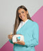 Free Front View Of Woman In Hoodie Holding Make-Up Pouch Psd